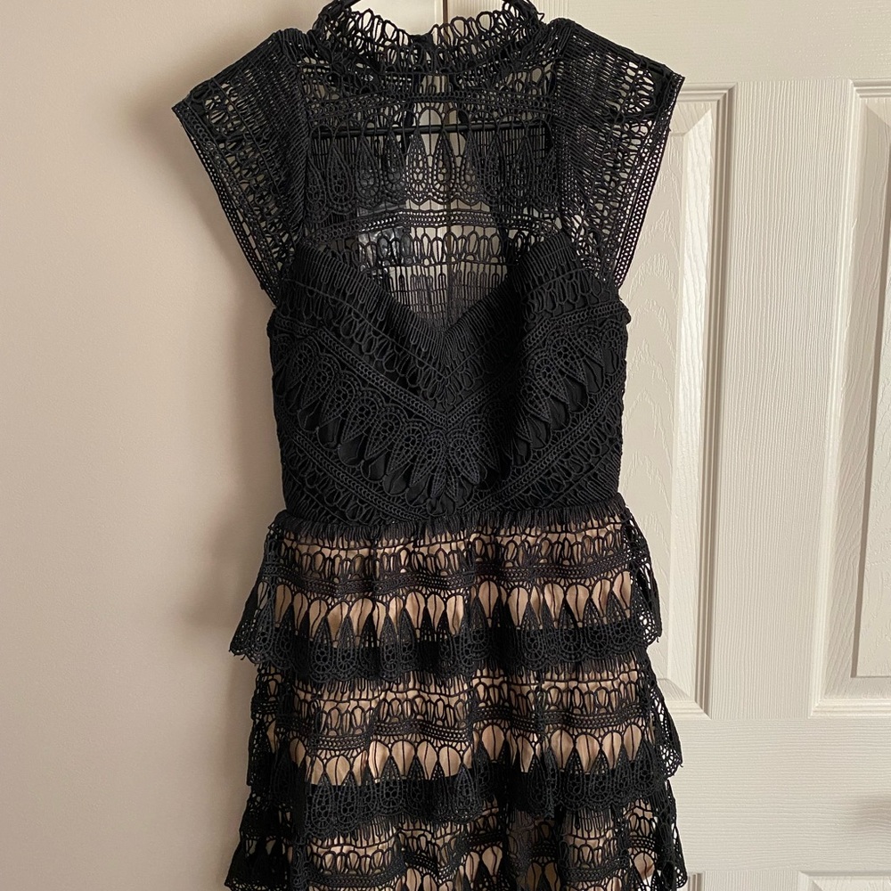 Black lace mini Bebe dress.